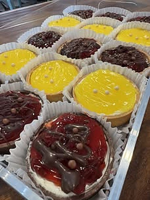 Tray of fresh fruit and lemon tarts at Peach Tree Bakery